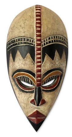 an african mask on a white background