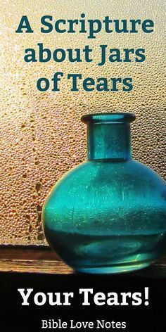 a blue vase sitting on top of a wooden table next to a window with the words, your tears bible love notes