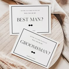 two cards with the words best man and groomsman on them sitting next to each other