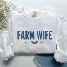 Farm Shirts Granola Girl Farmer Wife Shirt, Wife of Farmer Sweatshirt, Popular Comfort Colors® Feminine Farme Crewneck Pullover, Unisex plus size too Get yours today! Farm Shirts, New Shirt Design, Farm Wife, Girl Sweat, Farmer Wife, Vinyl Shirts, Granola Girl, Girl Shirt, Silhouette Projects