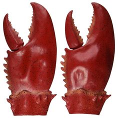 two large red lobsters with spikes on them