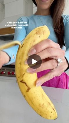 a woman holding a banana in her hand with the caption if you want a banana, it's almost as important to eat and not butter