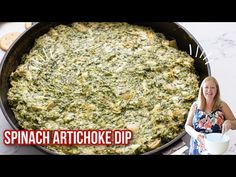 the spinach artichoke dip recipe is ready to be served in the oven