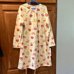 Carters Lightweight Long Sleeved Night Gown. Feminine Flower Button At Neck Along With Cute Trim At Cuffs Cute Long Sleeve Dresses For Pajama Party, Multicolor Long Sleeve Sleep Dress, Cute Long Sleeve Nightgown For Pajama Party, Casual Nightgown For Loungewear, Christmas Nightgowns, One Piece Gown, Sleep Gown, Poka Dot, Girls Nightgown