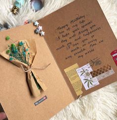 a handmade greeting card with flowers on it and a message written in cursive writing