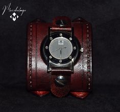 "Blink Leather Cuff Watch, 2.5 inches wide and fits 6.5- 9.5 inches wrist, stylish  unisex  leather cuff watch dyed in burgundy, , inspired by the early Johnny Depp cuff, made of American vegetable tanned leather and polished and finished with the waxed top coat to give it a vintage look. Item includes watch face and is removable and interchangeable. Upon request can be made to your size in a different color of your choice. Completely hand made using traditional tools and techniques. This is a \ Brown Band Watch, Leather Watch Cuff, Johnny Depp Style, Brown Watch, Brown Watches, Cuff Watch, Style Watch, Watch Faces, Leather Cuffs