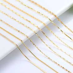 SPECIFICATIONSBrand Name: HOYONItem Weight: 0.01gOrigin: Mainland ChinaCertificate: YESMain Stone: noneMetals Type: NoneGender: WomenNecklace Type: Chains NecklacesOccasion: AnniversaryChain Type: Snake ChainItem Type: NECKLACESCertificate Type: Third Party AppraisalStyle: TRENDYSide Stone: NoneCertificate Number: GDTCModel Number: K gold plated chainis_customized: YesShape\pattern: StarFine or Fashion: FineType: chain necklacePack: Independent packaging with jewelry boxSuitable for gift-giving Bone Necklace, Color Necklace, Cross Chain, Laura Geller, Jewelry Making Charms, Cow Boy, Birthday Jewelry Gift, Copper Necklace, Yellow Gold Chain