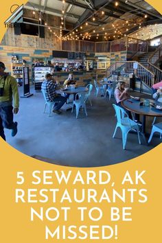 a restaurant with people sitting at tables in the center and an orange circle overlay that says, 5 seward ak restaurants not to be missed