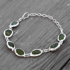 Natural Green Peridot Gemstone Bracelet \ Vintage Bracelet \ Chain Bracelet \ Adjustable Bracelet \ Bracelet For Her \ Minimalist Bracelet Stone Size    : 13 x 11 mm Weight          : 18.26 gm Bangle Size  : 10 inches Color             : Green Material        : Copper Polish            : All Polish Available   . Contact us for wholesale prices. R I N G S https://www.etsy.com/in-en/shop/GemFormingStudio?section_id=22783374 B E A D S https://www.etsy.com/in-en/shop/GemFormingStudio?section_id=2282 Peridot Bracelet, Bracelet For Her, Bracelet Stone, Gemstone Bangle, Electroformed Jewelry, Handmade Bangles, Dope Jewelry, Bracelet Chain, Bracelet Gemstone