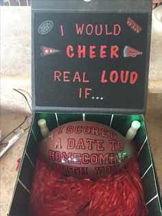 a football in a box that says, i would cheer real loud if i score a date to home coming with you