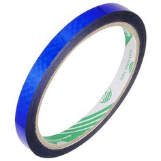 a roll of blue tape on a white background