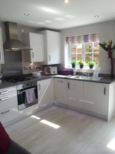 the kitchen is clean and ready for us to use in its new owner's home