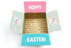 an open box with the word hoppy on it, and two boxes with different designs