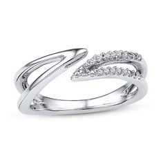 a white gold ring with diamonds on it