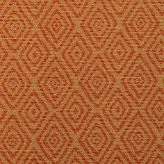 an orange and gold fabric with diamond shapes