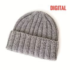 a gray knitted hat with the words digital on it and an image of a white background