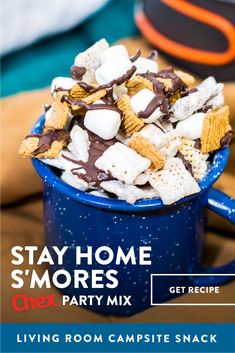 s'mores chex party mix in a blue mug with text overlay