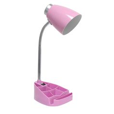 a pink desk lamp that is on top of a white surface with drawers underneath it