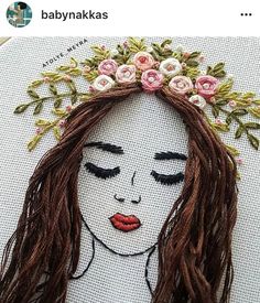 a woman with long hair and flowers on her head is depicted in this embroidery pattern