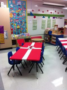 an image of a classroom with tables and chairs