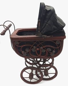 an old fashioned baby's pram is shown against a white background