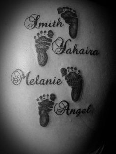 a woman's back with three baby footprints and the names of her children