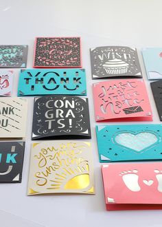 many different types of greeting cards on a white surface with the words thank you and cupcakes