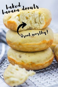 a stack of baked banana donuts sitting on top of a cooling rack