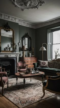 a living room filled with furniture and a fire place in front of a mirror on the wall