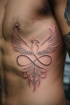 a man with a tattoo on his chest has a bird in the middle of it