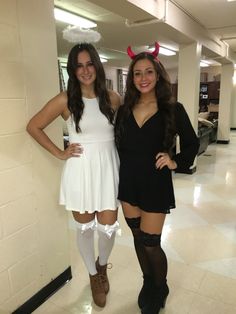 two girls dressed up in devil costumes posing for the camera with their hands on their hipss