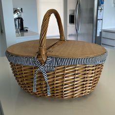 a wicker basket sitting on top of a kitchen counter