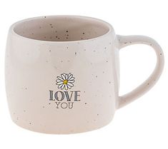 a white coffee mug with the words love you written on it and a daisy in the center