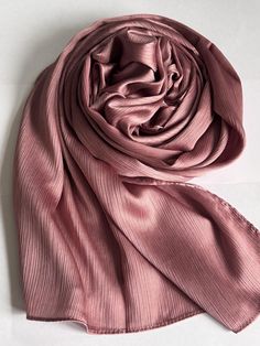 STUNNING LUXURY BLUSH PINK SCARF Beautiful delicate soft lightweight textured scarf This scarf is a perfect accessory for both daytime and evening wedding wear worn as a shawl & wrap  Made from silk 30% Viscose 70% colour-pink  188cm length x 140cm width (approx)  Note: The scarf's colour may appear slightly different in person, as screen settings and lighting can affect how it looks on the phone or computer.