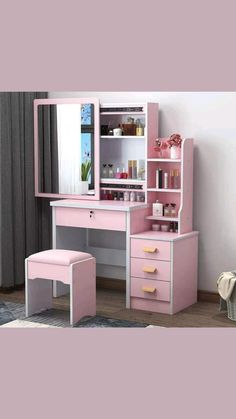 a pink desk with a mirror and stool