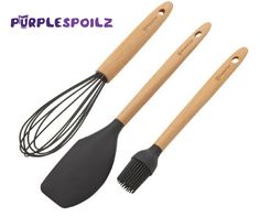 three kitchen utensils with wooden handles and wire whisks on them are shown