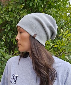 This is a heather grey cotton ribbed slouchy beanie. This hat is very comfy, a medium weight rib adds a chunky look to this beanie.  The nature of this fabric is very strechy so this hat will be a comfy slouchy fit. The following are the (unstretched) measurement of each hat around head.  For example I have a 21" head, I wear a MEDIUM and its a comfy fit.  XS: 17" - Toddler Small: 18" - Child Medium: 19" - Teen/ Small Women  Large: 21" - Large Adult XL: 23" - XL Adult XXL: 25" XXL Adult Casual Slouchy Hat, Casual One Size Bonnet Cap, Casual Gray Beanie Hat, Casual Solid Color Bonnet, One Size, Casual Solid Color Bonnet, Casual One Size Fits Most Bonnet, Casual Everyday Beanie Bonnet, Casual Brimmed Beanie One Size Fits Most, Everyday Beanie Hat One Size Fits Most