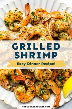 grilled shrimp on a plate with lemon wedges and parsley garnish