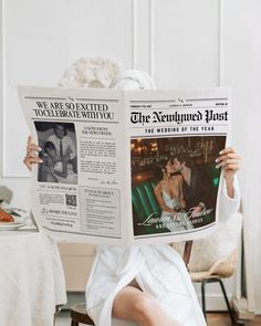 a woman sitting in a chair holding up a newspaper to her face with the front page