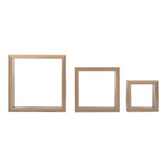 three empty wooden frames on a white background