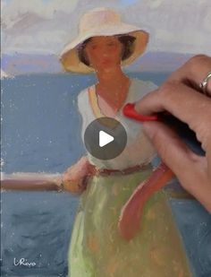 a woman in a yellow dress and white hat painting