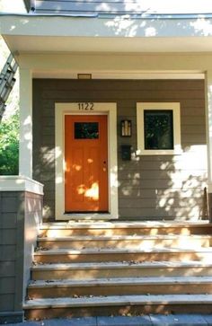 a house with steps leading up to the front door