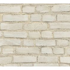 a white brick wall with no mortars or mortars on the bottom and sides