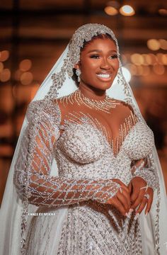 a woman wearing a wedding dress and veil