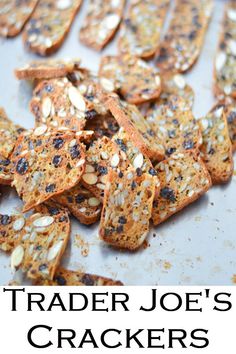 trader joe's crackers on a baking sheet with the words trader joe's crackers