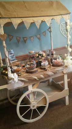 an old fashioned wagon with sweets on it