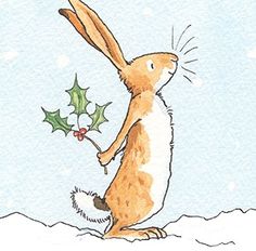 a brown and white rabbit holding a holly berry in its mouth while standing on it's hind legs