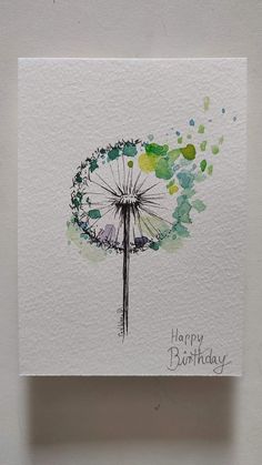 a dandelion birthday card with the words happy birthday written in watercolor on it