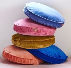 four pillows stacked on top of each other