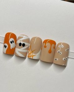 Keep your Halloween nails simple and festive with these easy-to-create designs for 2024! From ghostly whites to eerie blacks, these nails capture the spooky season without overdoing it. 🕷️ Perfect for those who love a subtle nod to Halloween, these designs are both fun and fashionable. Discover more ideas today! #HalloweenNailArt #SpookySeason #SimpleNails Halloween Nails Paint, White Nails Ideas Square, Nails Halloween October Short, Black Nails With Pumpkin, Halloween Short Square Nails, Fun Halloween Nails Short, Fall Nails Spooky, Gel Nails Ideas Halloween, Spooky Square Nails